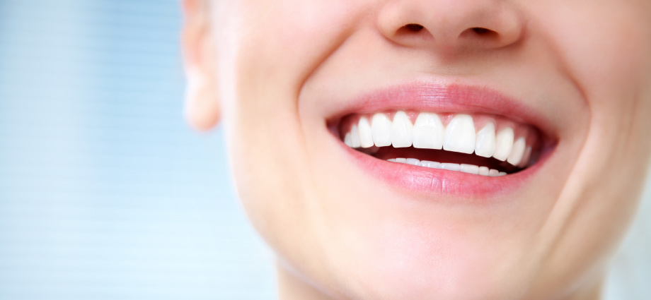 woman's smile with healthy gums not receding