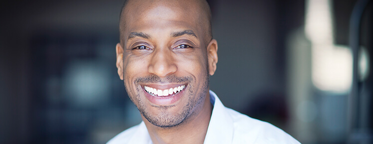 man smiling after getting teeth cleaned