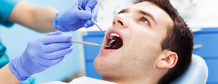 man receiving dental work