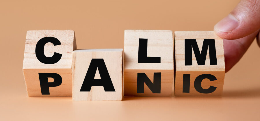 Wooden blocks being turned from PANIC to CALM due to dental sedation