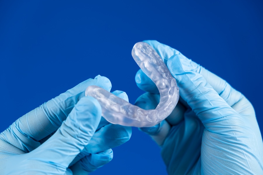 custom nightguard to protect teeth from grinding, or bruxism to prevent cracked teeth